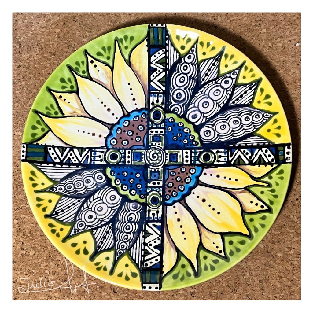 Portfolio Ceramic - abstract sunflower small plate. A lot mandala geometry in the colors: yellow, light and dark green, light and dark blie, brown, black and white.